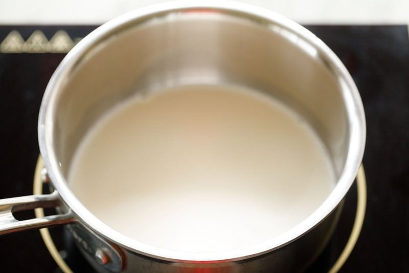 heating milk in a saucepan for making cocoa solution.