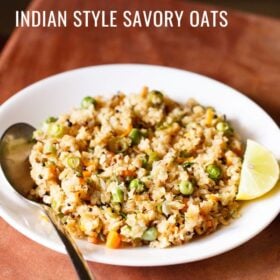 oats upma with lemon wedge and a spoon on white plate on a brown board with text layovers.