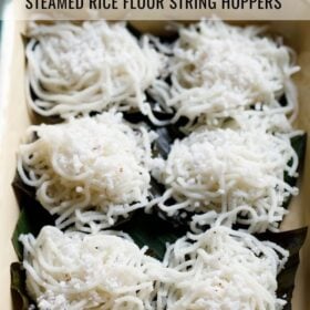 idiyappam sprinkled with grated coconut and placed on banana leaves on a tray with a bowl of coconut chutney kept on the top left side and text layovers.