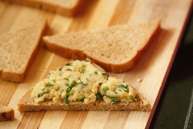 potato stuffing spread on bread slice.