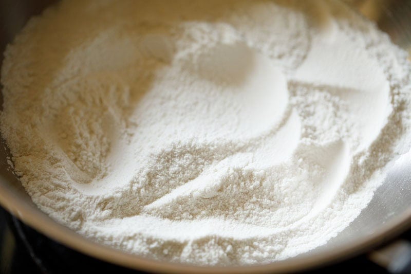 roasted rice flour in pan.