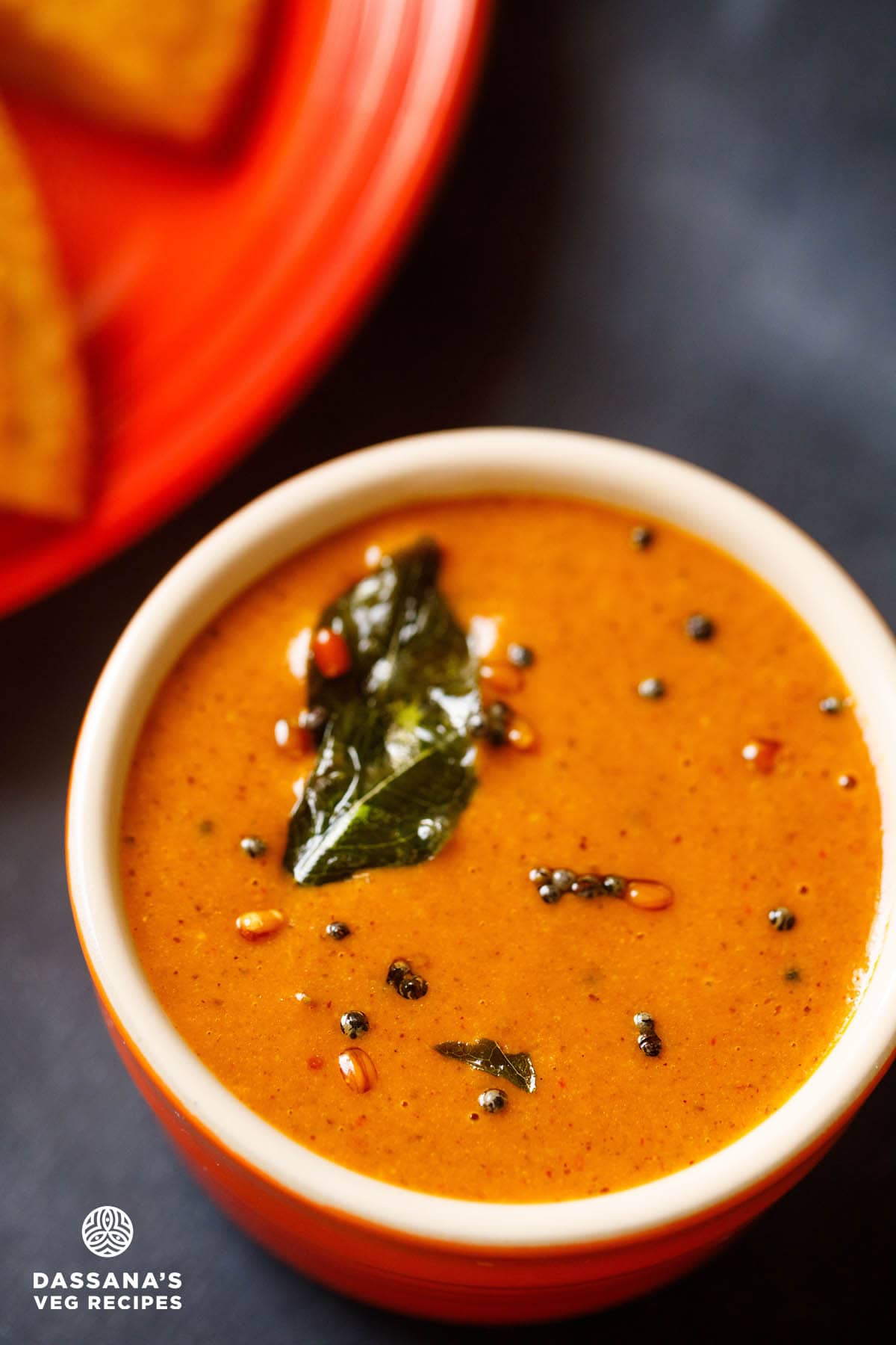 allam pachadi in a serving bowl topped with tempering mixture.