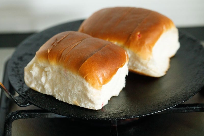 Two buns on skillet.