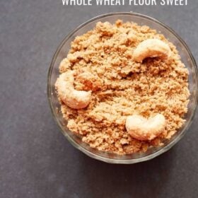 panjiri in a glass bowl topped with cashews with text layovers.