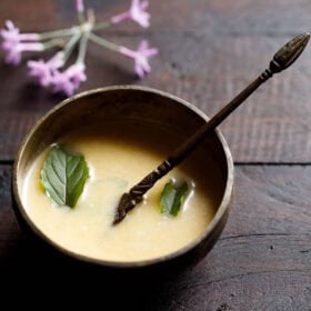 Bowl of sacred panchamrit with a spoon.