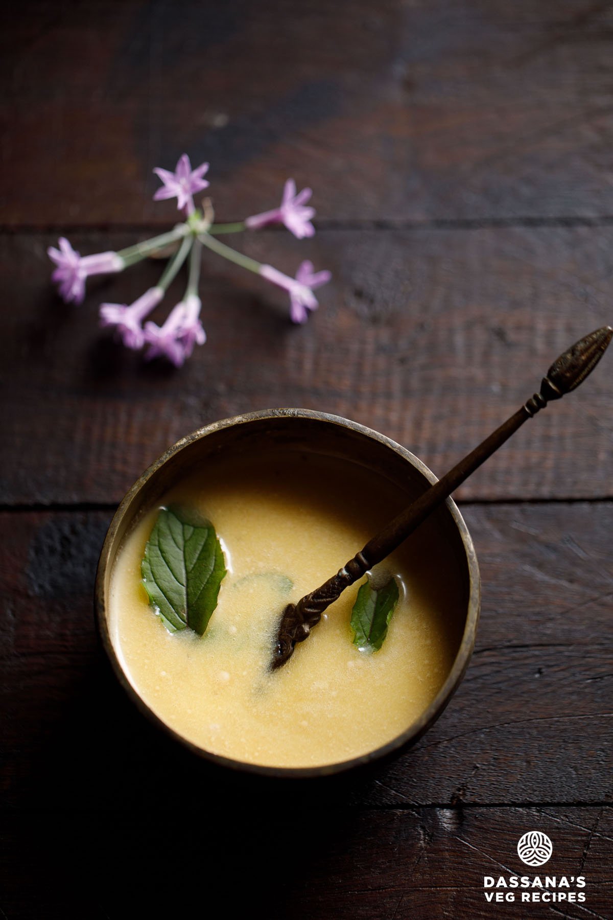 Bowl of panchamrut with holy basil leaves (tulsi).