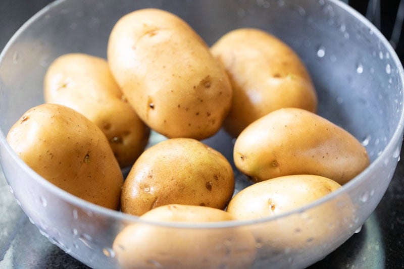 Fresh potatoes in a bowl.