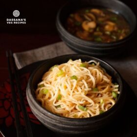 Delicious chilli garlic noodles in bowl with text layovers.