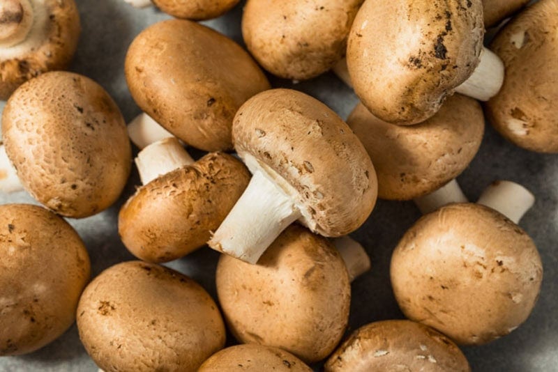 Closeup shot of cremini mushrooms.