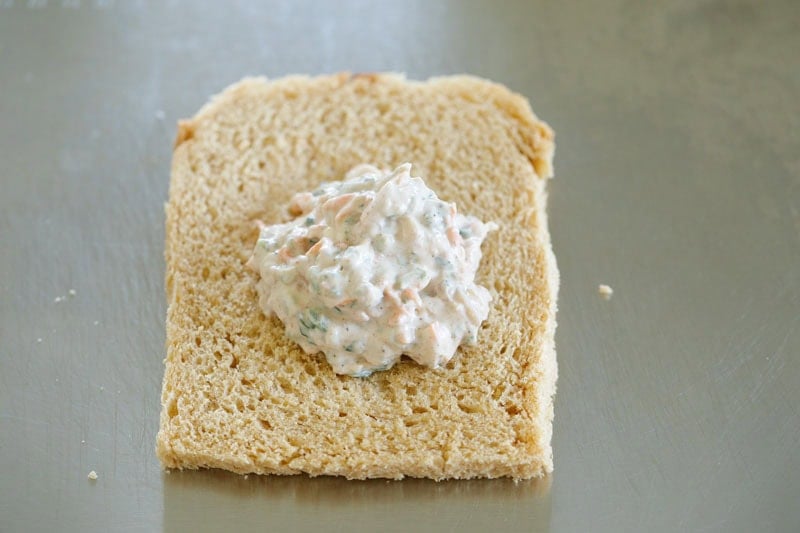 Bread slice with creamy dahi filling in the center.