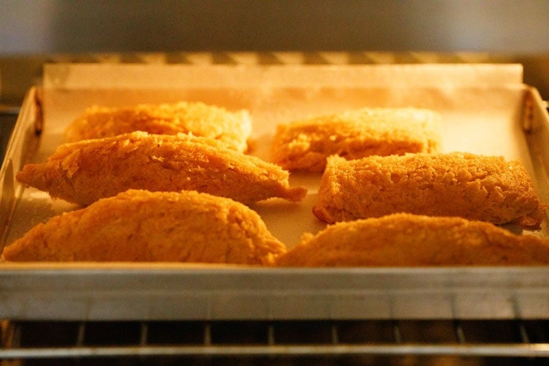 Dahi ke sholay getting baked in the oven.