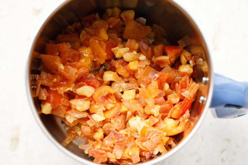 Sautéed onions, tomatoes etc in a blender jar.