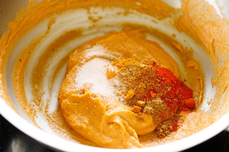 Ground spices on top of the masala paste.