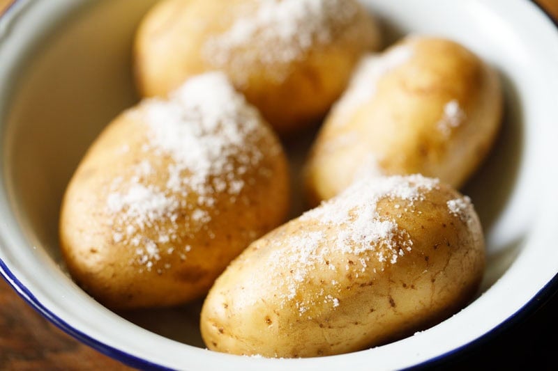 Salt sprinkled on potatoes.