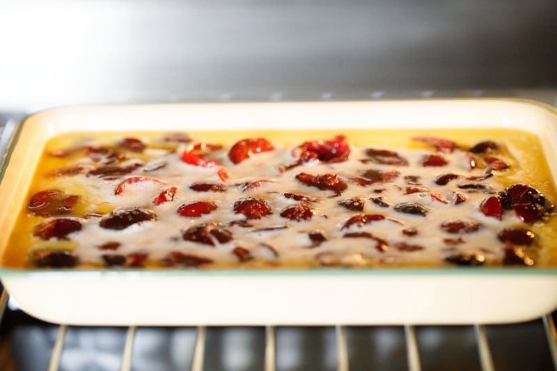 Baking cherry cobbler in oven.