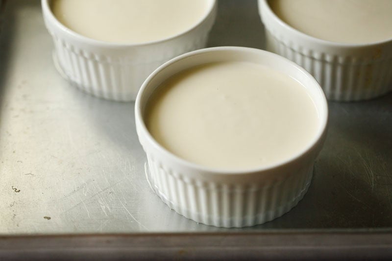 Tray with ramekins filled with some hot water.