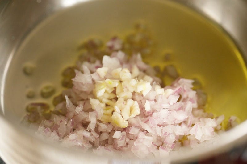 Chopped onions and garlic in a pan.