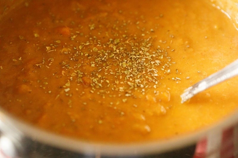 Thick lentil soup with dried herbs.