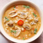 Mushroom barley soup in a bowl.