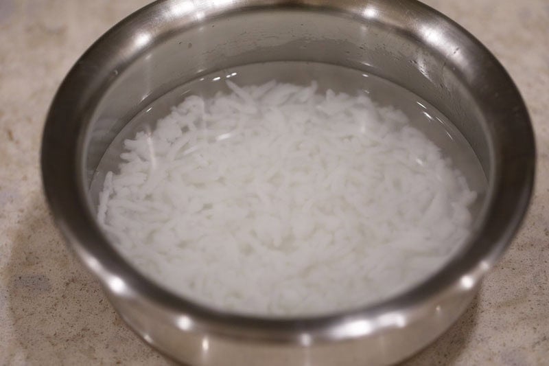 Soaked rice in a bowl.