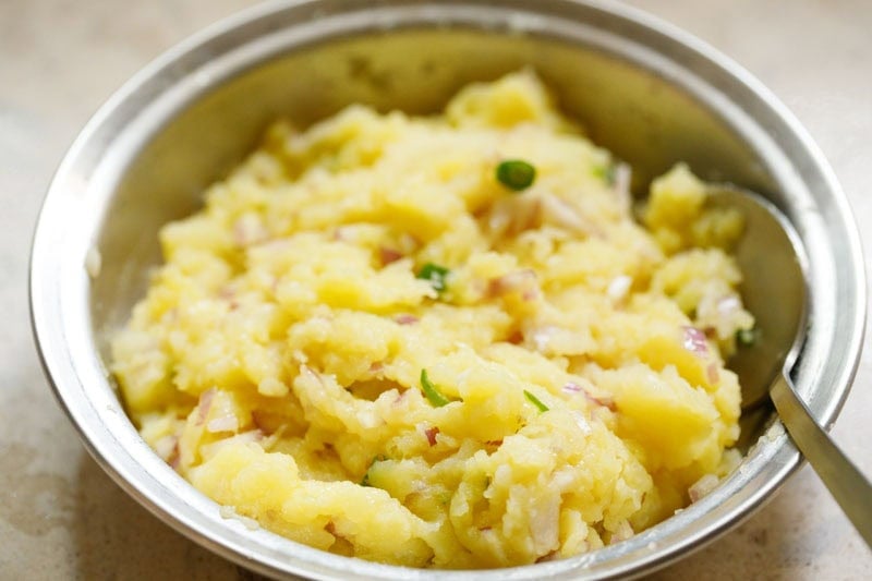 Spiced mashed potatoes in a bowl.