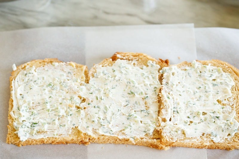 Cream cheese mayo mixture spread on bread slices.