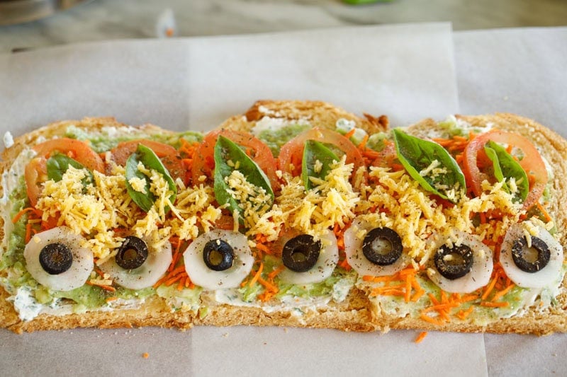 Topped with grated cheddar.