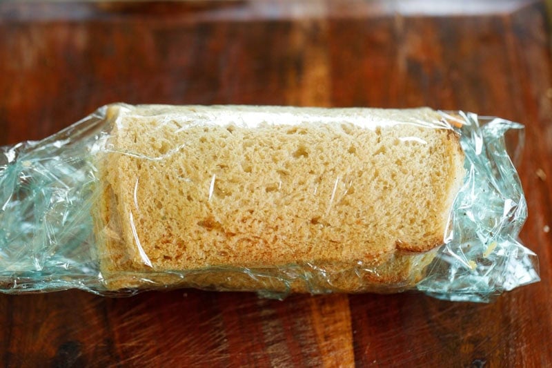 Folded pinwheel sandwich inside cling film.