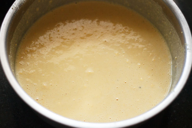 gram flour batter in a shallow bowl.