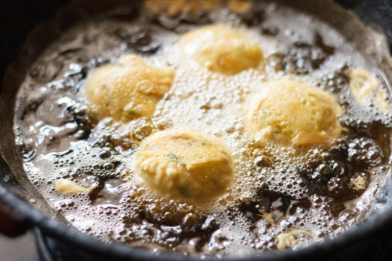 fried golden vada in hot oil.