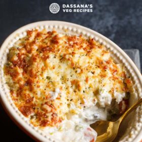 Creamy veg au gratin dish with text layovers.