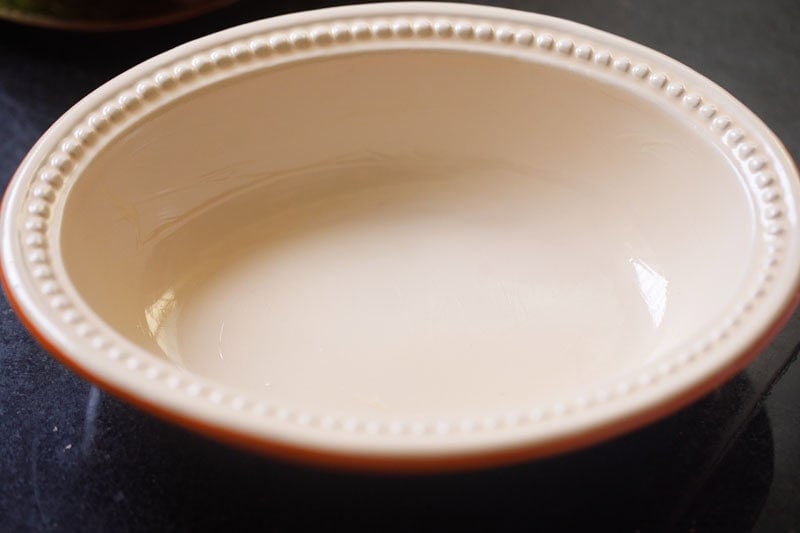 Empty oval serving dish on countertop