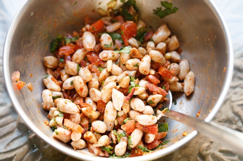 Bowl of spicy boiled peanut chaat.