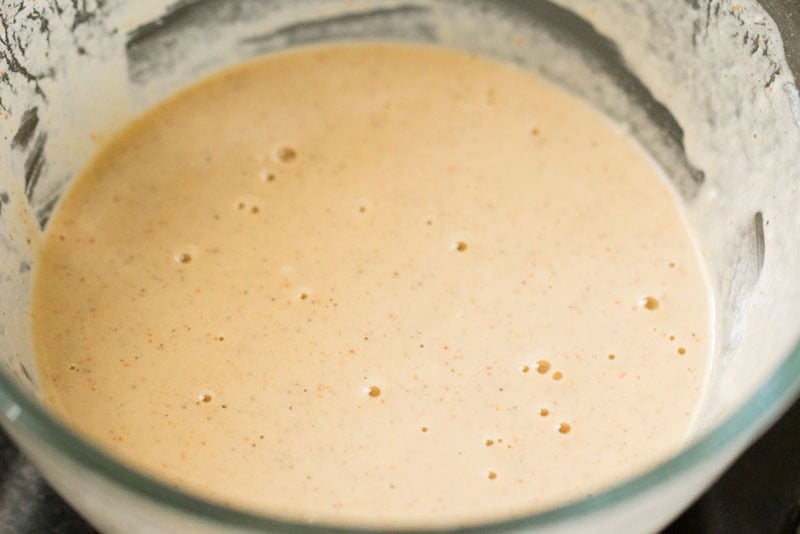 Thick batter in glass bowl.