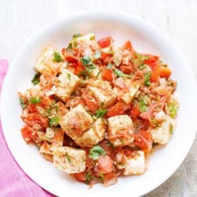 Fresh paneer salad with text layovers.