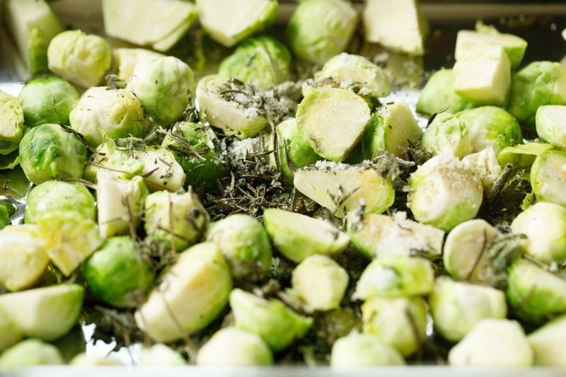 Chopped Brussels sprouts with herbs and seasonings.