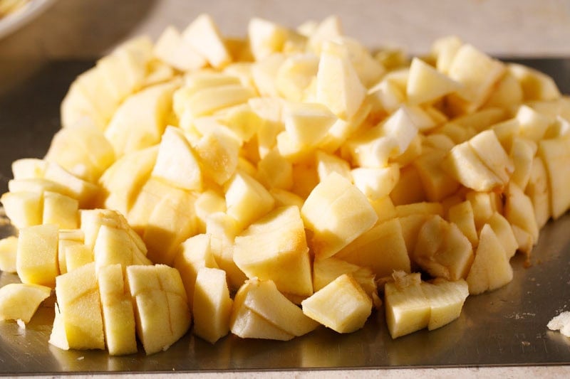 Chopped apples on tray.