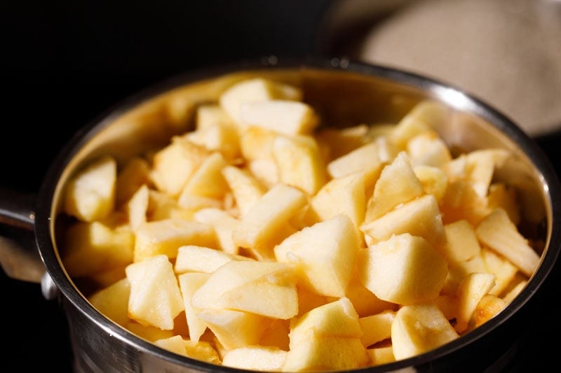 Chopped apples in saucepan.