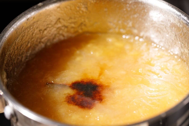 Vanilla extract added to apple jam.