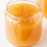 Apple jam in a glass jar.