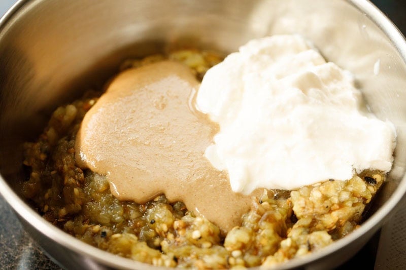 Mixed eggplant, tahini and yogurt in a blender.