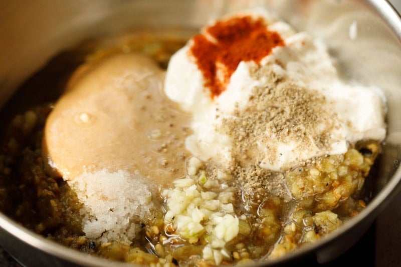 Ingredients for baba ganoush preparation in a blender.