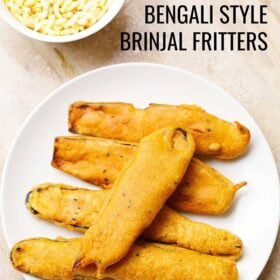 Bengali beguni or brinjal fritters on plate.