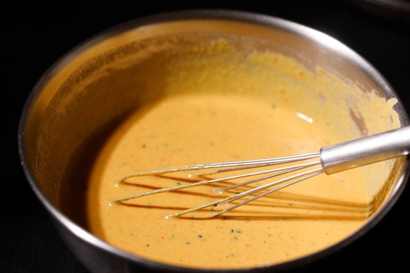 Bowl of gram flour batter.
