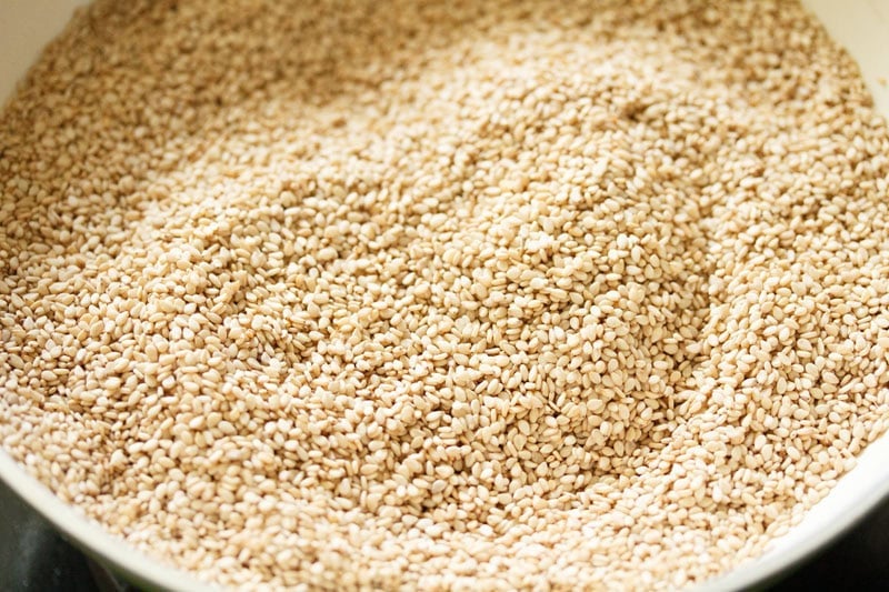 Lightly toasted sesame seeds in the pan.