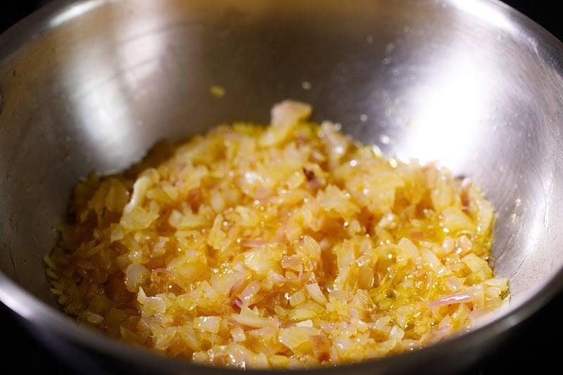 Sautéed onions in pan.