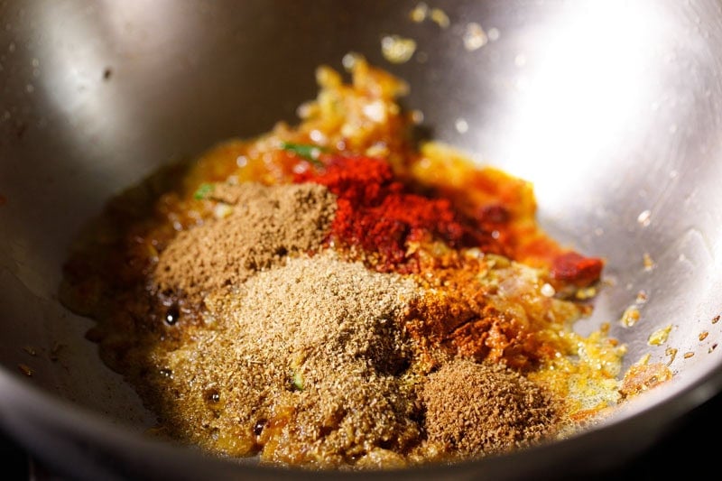 Ground spices in pan.