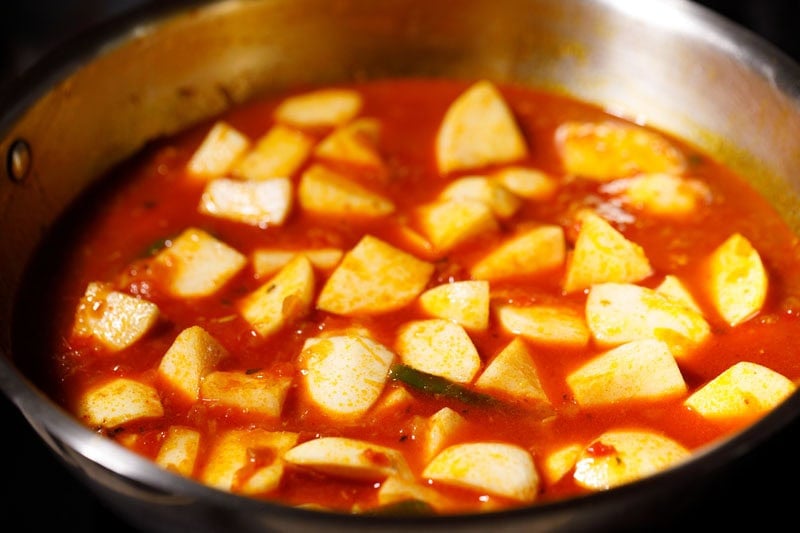 Water mixed with masala to make turnip curry recipe.