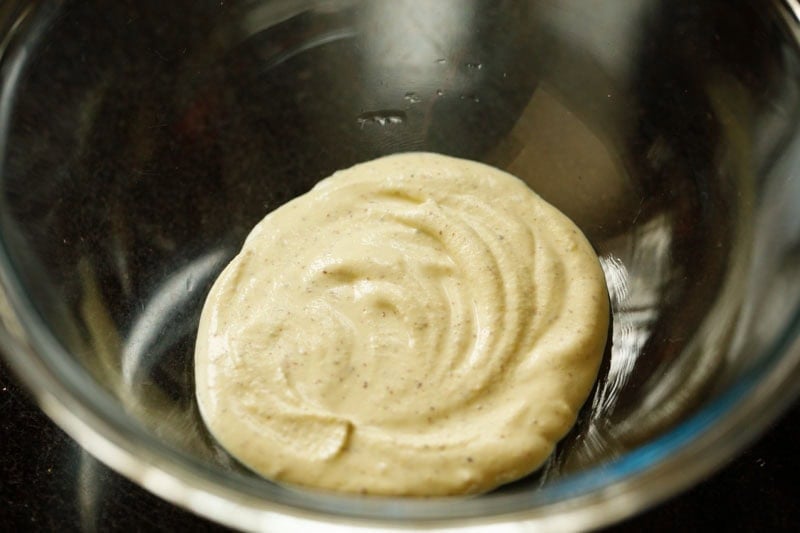 Creamy mayonnaise in a glass bowl.