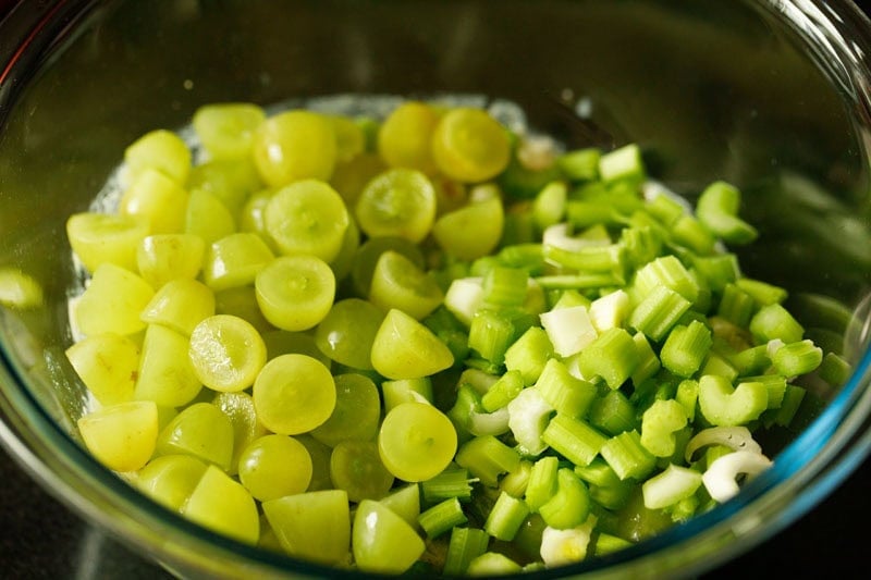 Chopped green grapes and celery.
